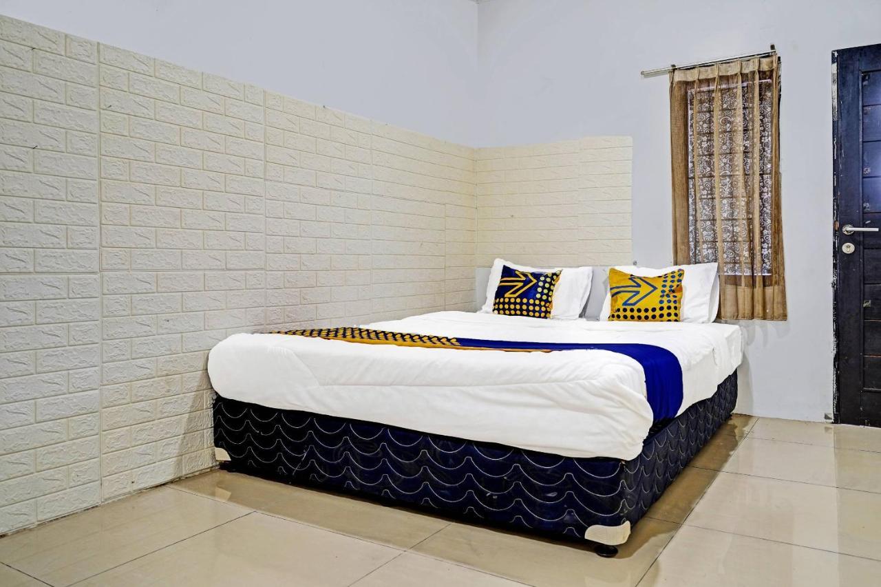 Oyo 91330 Munigar Syariah Hotel 2*